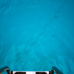 Top,View,Of,Swimming,Pool,With,Stairs