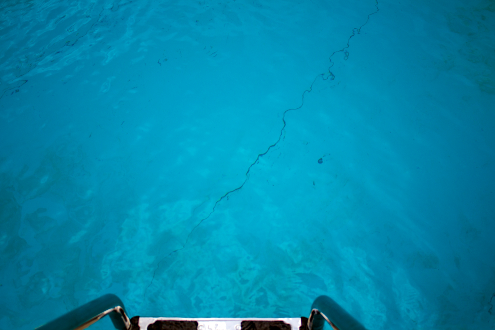 Top,View,Of,Swimming,Pool,With,Stairs